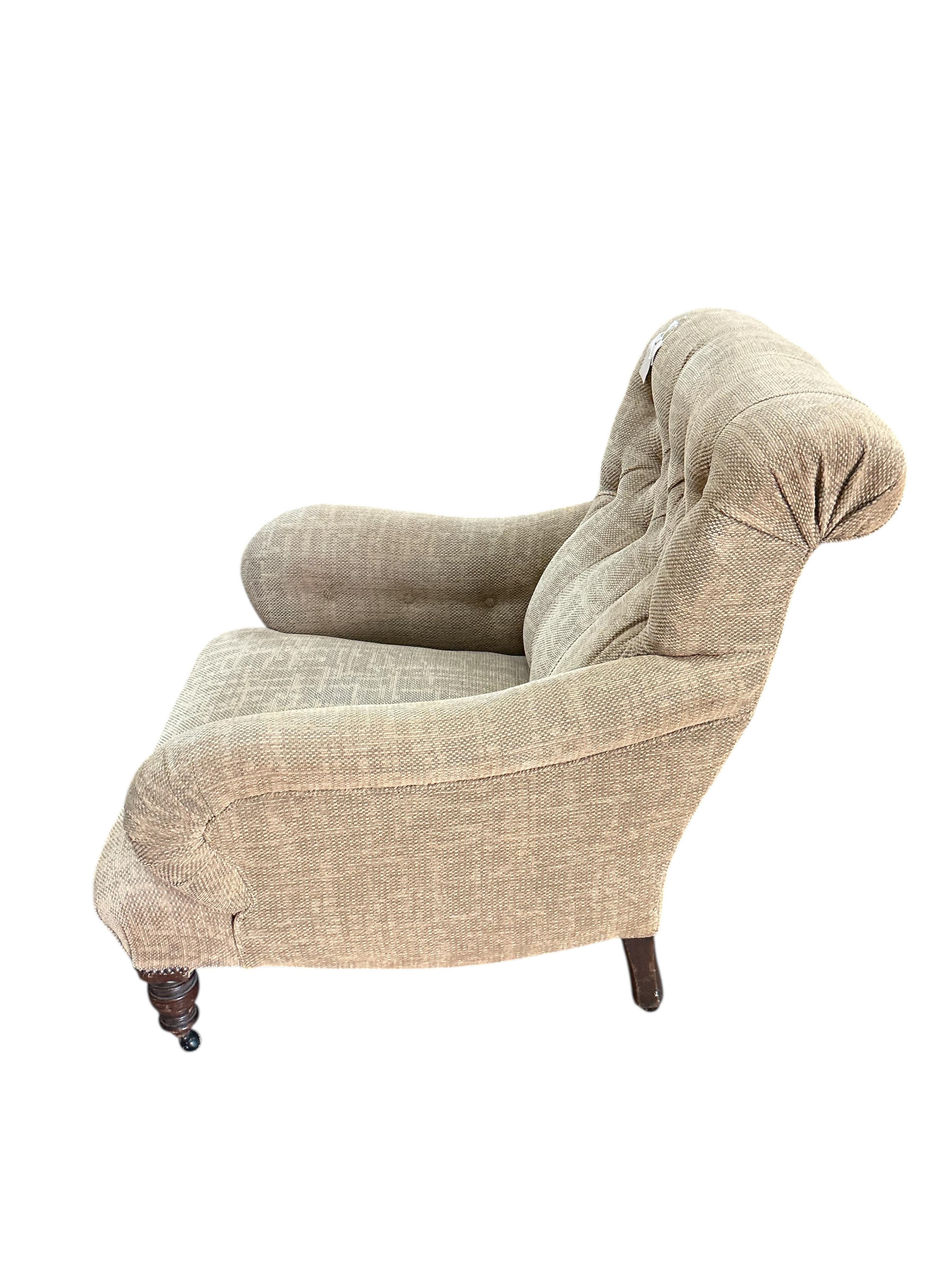 A Victorian Howard style armchair upholstered in buttoned brown tweed type fabric, width 82cm, depth 88cm, height 86cm